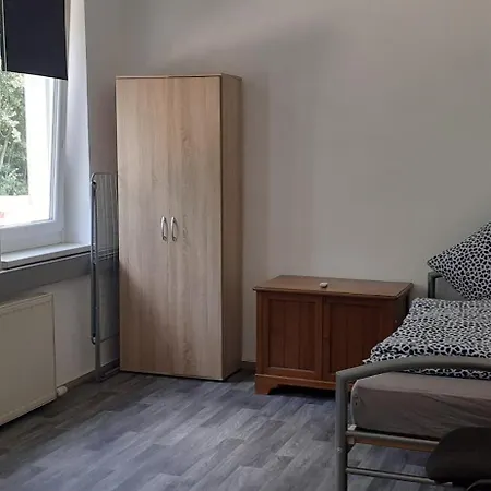In Quarto em Acomodações Particulares *